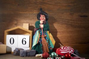 the-befana-with-sweet-coal-and-candy-italian-epiphany-day-tradition