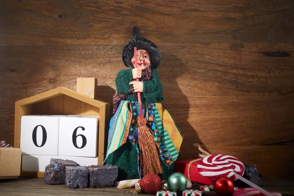 the-befana-with-sweet-coal-and-candy-italian-epiphany-day-tradition