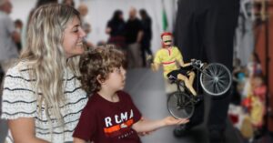 A parent and child up close with a puppet from the ILC Di Filippo Marionette Show in Brisbane 2 May 2026