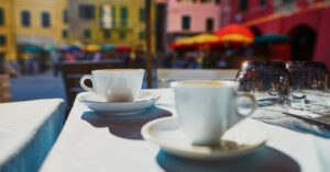 International Coffee Day - Coffee at a cafe in Vernazza, one of five famous villages of Cinque Terre in Liguria, Italy